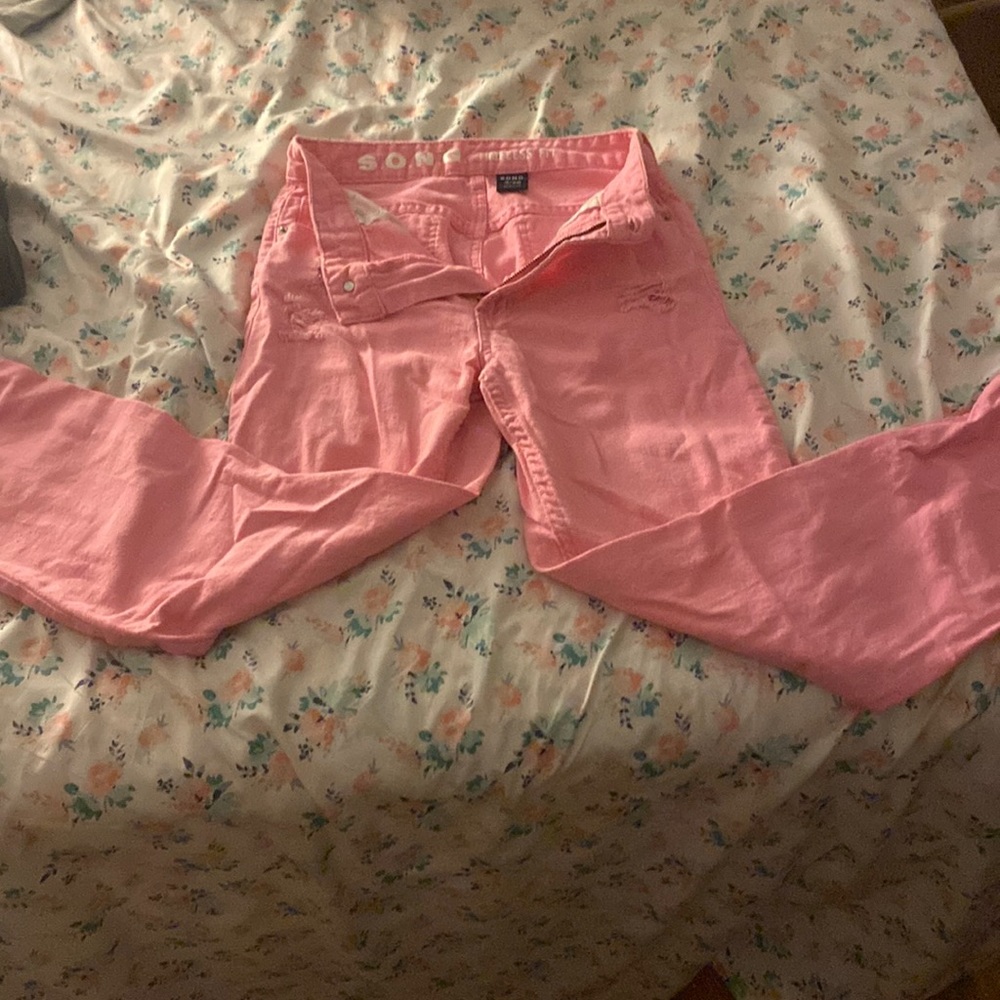 Bubblegum Pink High rise denim pink jeans with rips